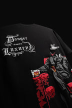 DANGER DRAPED IN LUXURY TEE